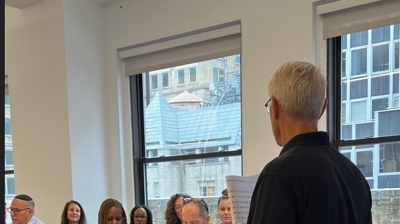 Glenn teaching the room at in inhouse conference Photo