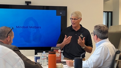 Glenn speaking with leaders Photo