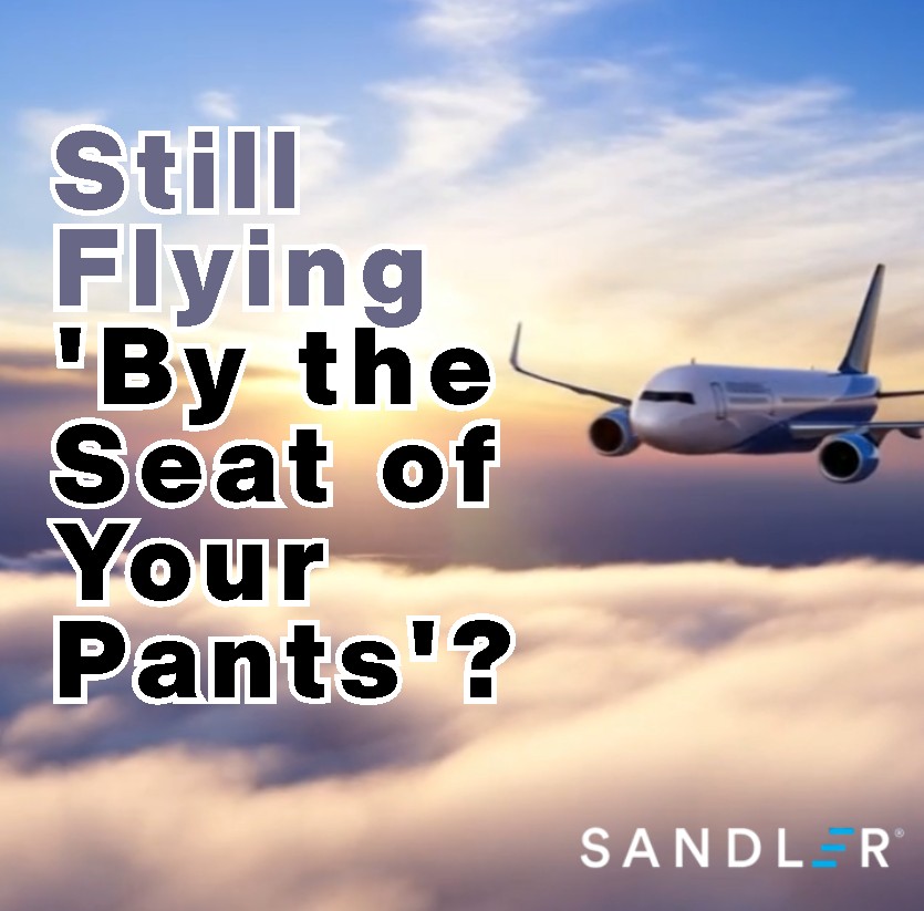 Airplane flying through clouds with text asking Are You Flying Your Revenue By the Seat of Your Pants Sandler Training