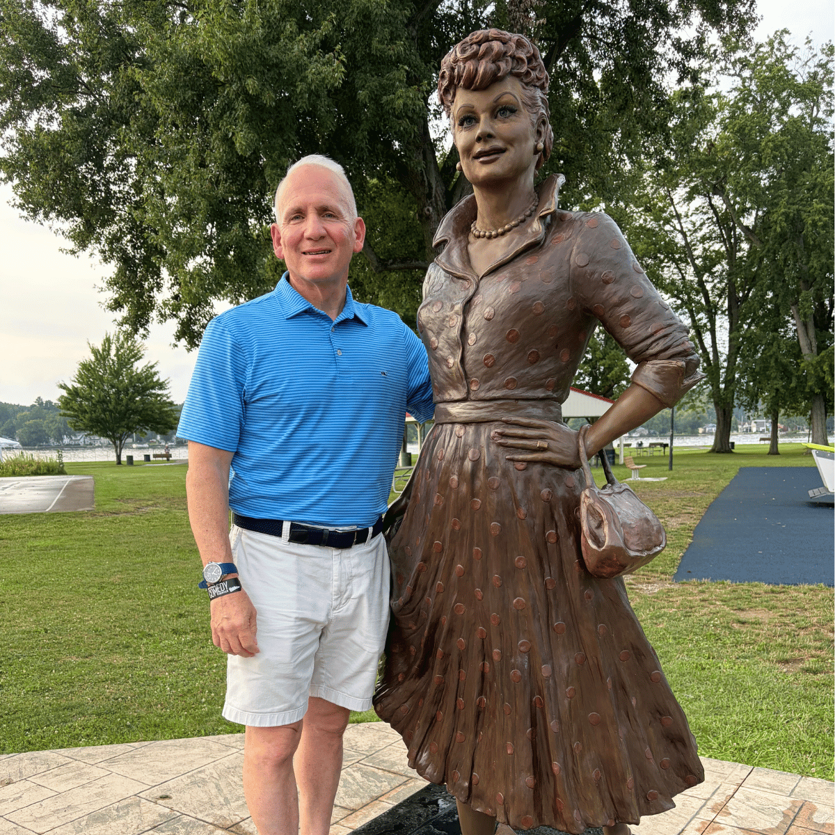 Danny Wood standing beside Lucy Ball Statue